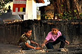 Dambulla cave. People offering to the bho tree.