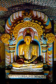 Dambulla cave temples - Cave 4, Paccima Viharaya (Western Temple). Buddha figure sits under an elaborate makara torana arch. 