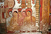 Dambulla cave temples - Cave 3, Maha Alut Viharaya (Great New Temple), paintings of the ceiling show the future Buddha, Maitreya, preaching in a Kandyan-looking pavilion to a group of ascetic disciples.