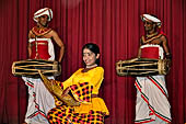 Kandyan dancing and drumming. The Kulu Dance, a traditional folk dance usually performed by village damsels. 