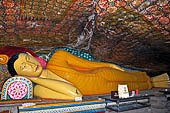 Mulkirigala cave temples - Third terrace. The Raja Mahavihara or the Old Temple. Reclined Buddha statue.