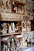 Mulkirigala cave temples - Third terrace. The Raja Mahavihara or the Old Temple. Jathaka stories paintings at the cave entrance.