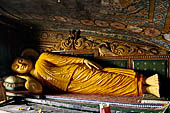 Mulkirigala cave temples - Third terrace. Naga Viharaya or Cobra temple. reclined Buddha image.