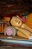 Mulkirigala cave temples - Third terrace. The Raja Mahavihara or the Old Temple. Reclined Buddha statue.