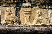 Polonnaruwa - the Citadel, the Council Chamber. Friezes of the platform with dwarfs, lions and galumphing elephants.