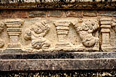 Polonnaruwa - the Citadel, the Council Chamber. Friezes of the platform with dwarfs, lions and galumphing elephants.