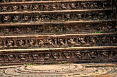 Polonnaruwa - the Vatadage. Detail of the decoration of the steps of the western stairway. 