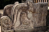 Polonnaruwa - the Vatadage. Detail of the balustrade of the main entrance (North) decorated with lions and makaras.