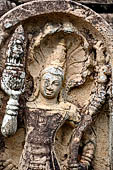 Polonnaruwa - the Vatadage. Detail of the Nagaraja of the guardstone of the southern stairway.