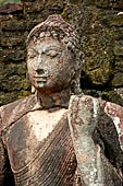 Polonnaruwa - Detail of Buddha statue of the Hatadage.  