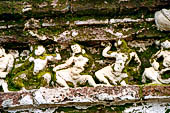 Polonnaruwa - The Hatadage. Weathered frieze on the wall with a representation of dancers. 