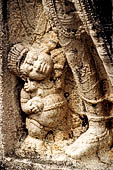 Polonnaruwa - the Vatadage. Detail of the dwarf (gana) attending the Nagaraja of the guardstone of the southern stairway. 