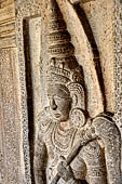 Kandy - The Sacred Tooth Relic Temple, detail of the carved stone entrance to the shrine. 