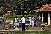 Kandy - Pilgrims to the Temple of the Sacred Tooth.  