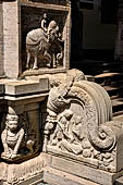 Kandy - The Sacred Tooth Relic Temple, the New Shrine Room. Details of the stone decorations of the external entrance.