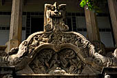 Kandy - The Sacred Tooth Relic Temple, the New Shrine Room. Details of the stone decorations of the external entrance.