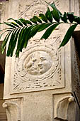 Kandy - The Sacred Tooth Relic Temple, Details of the carvings of the pillars in the Drummers Courtyard. 