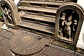 Kandy - The Sacred Tooth Relic Temple, guardstones of the stairway leading to the New Shrine Room.