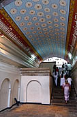 Kandy - The Sacred Tooth Relic Temple, entrance stairway: details of the canopy painted with lotuses and pictures of the perahera.