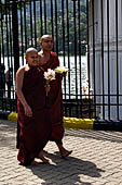 Kandy - Pilgrims to the Temple of the Sacred Tooth. 