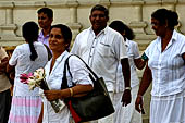 Kandy - Pilgrims to the Temple of the Sacred Tooth. 