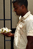 Kandy - Pilgrims to the Temple of the Sacred Tooth.