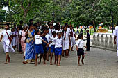 Kandy - Pilgrims to the Temple of the Sacred Tooth.