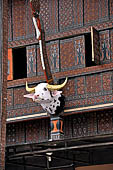 Bori Parinding villages - Traditional tongkonan house with buffalo head on front.