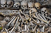 Ke'te Kesu - burial places, coffins full of bones and skulls lie rotting in piles