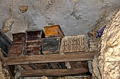 Londa - Burial places, coffins suspended on wooden beams 